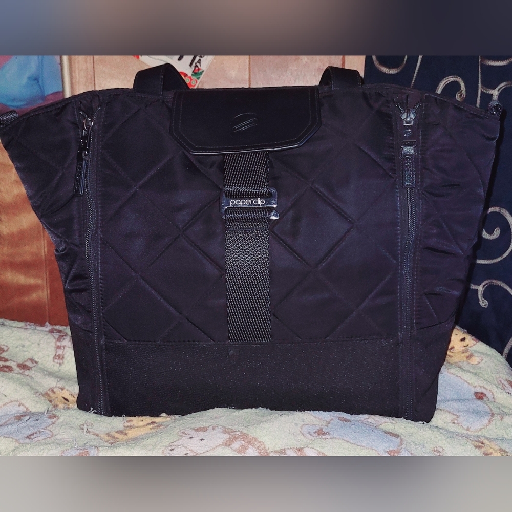 Name brand PAPERCLIP diaper bag in great shape that has convertible baby pad
